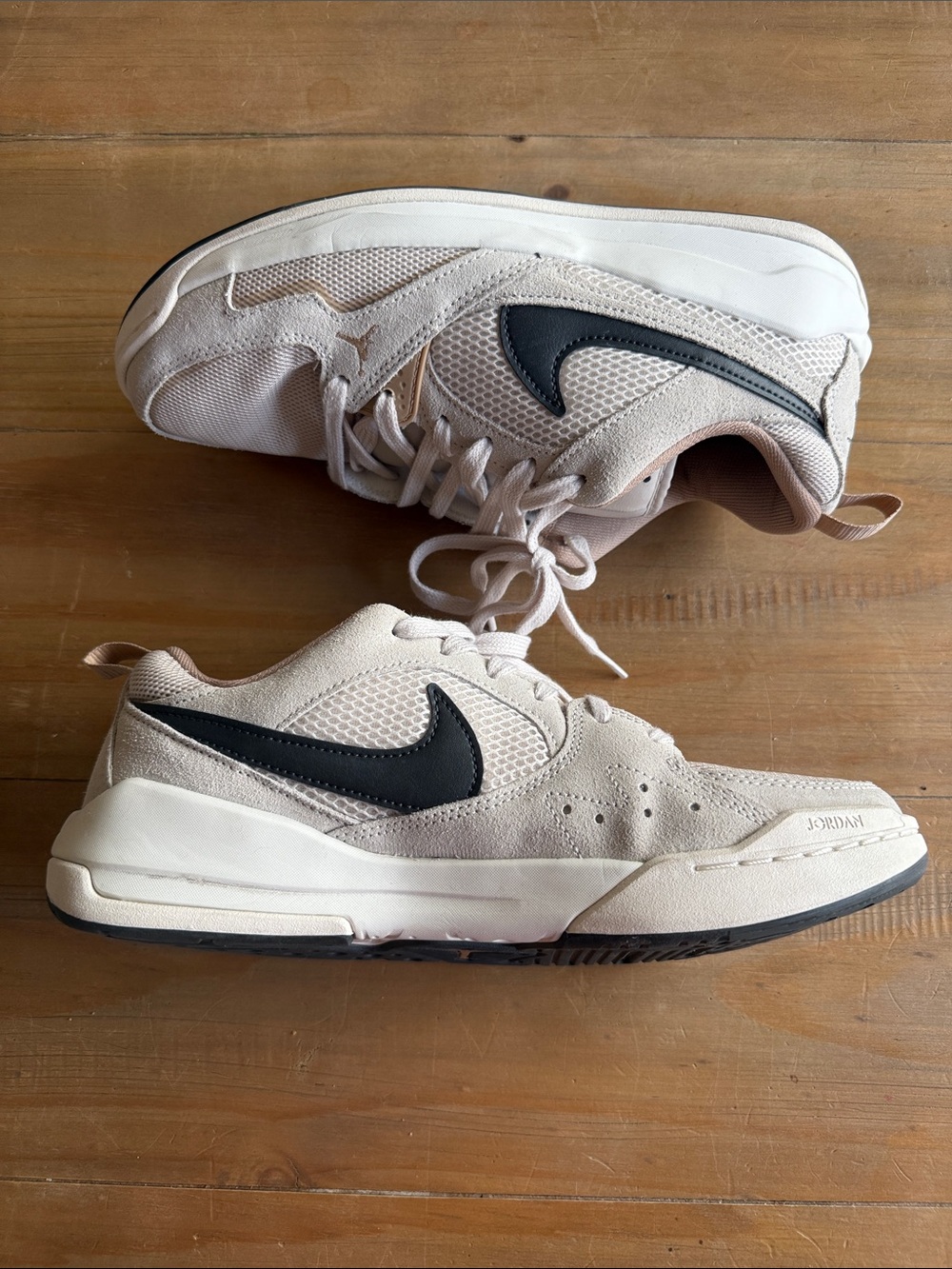 Women’s Light Beige Nike Jordan CMFT ERA Sneaker with Black Swoosh